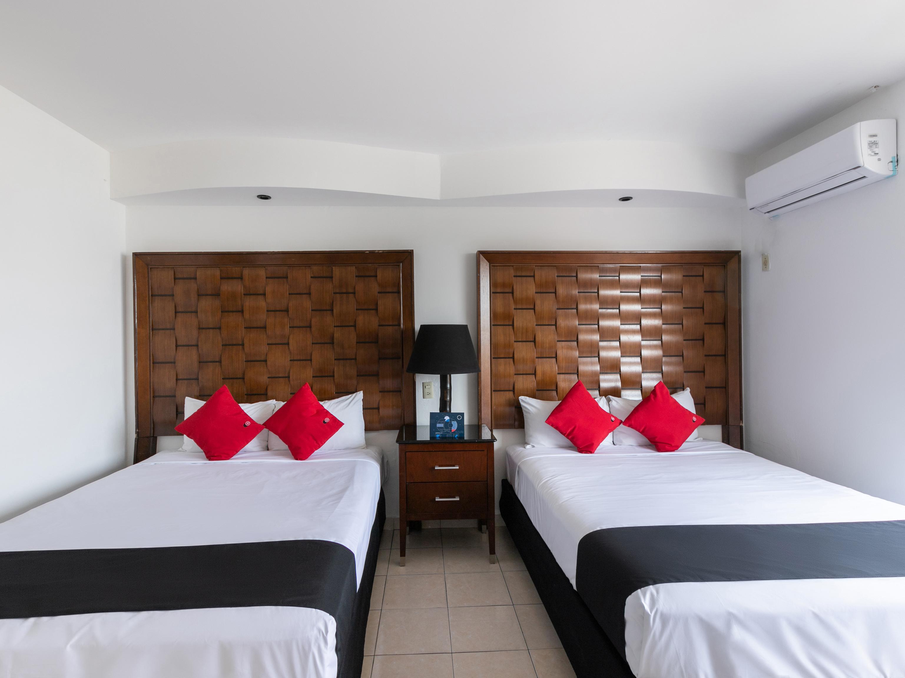 Capital O Zona Dorada Inn, Масатлан Экстерьер фото