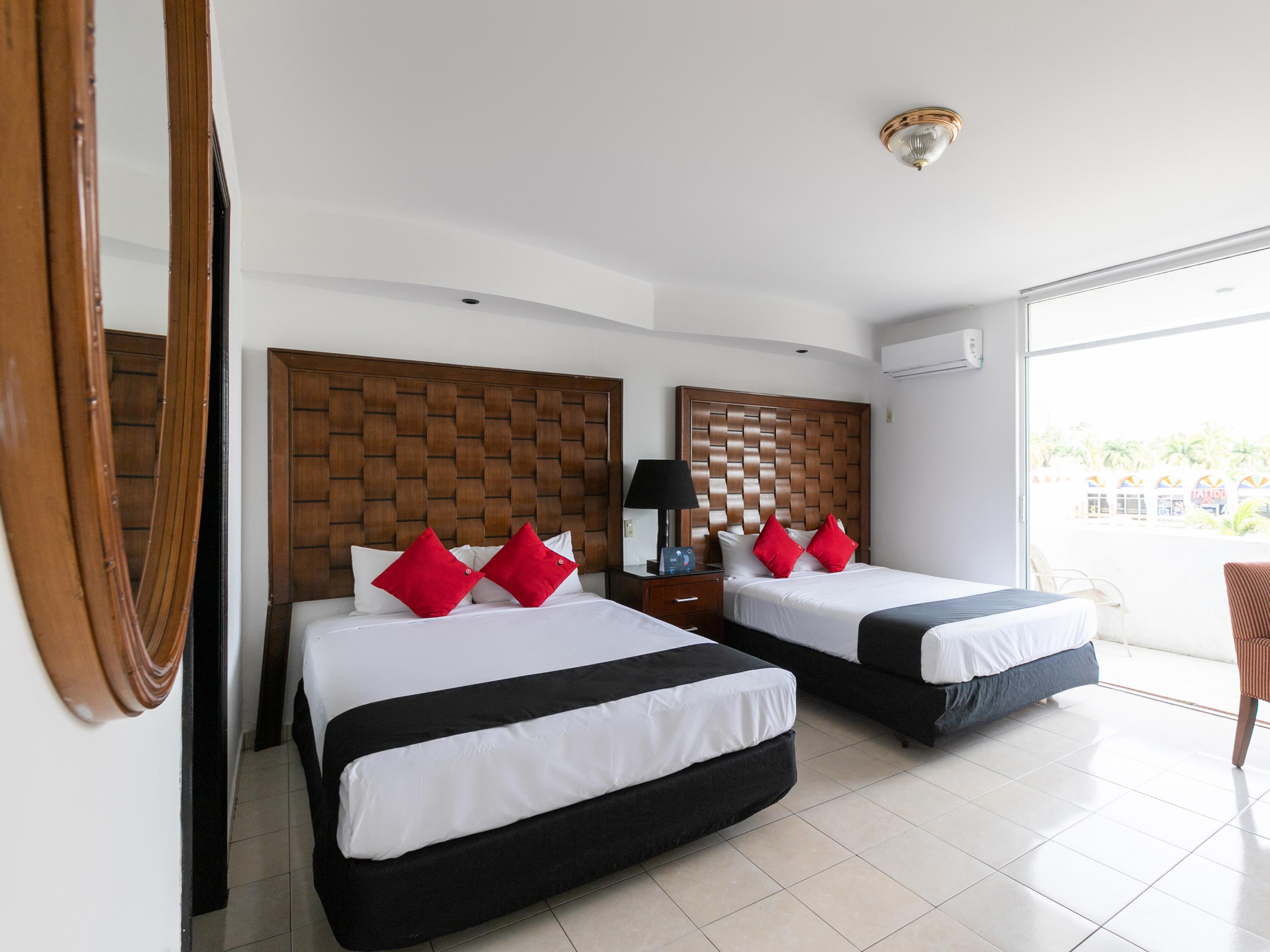 Capital O Zona Dorada Inn, Масатлан Экстерьер фото