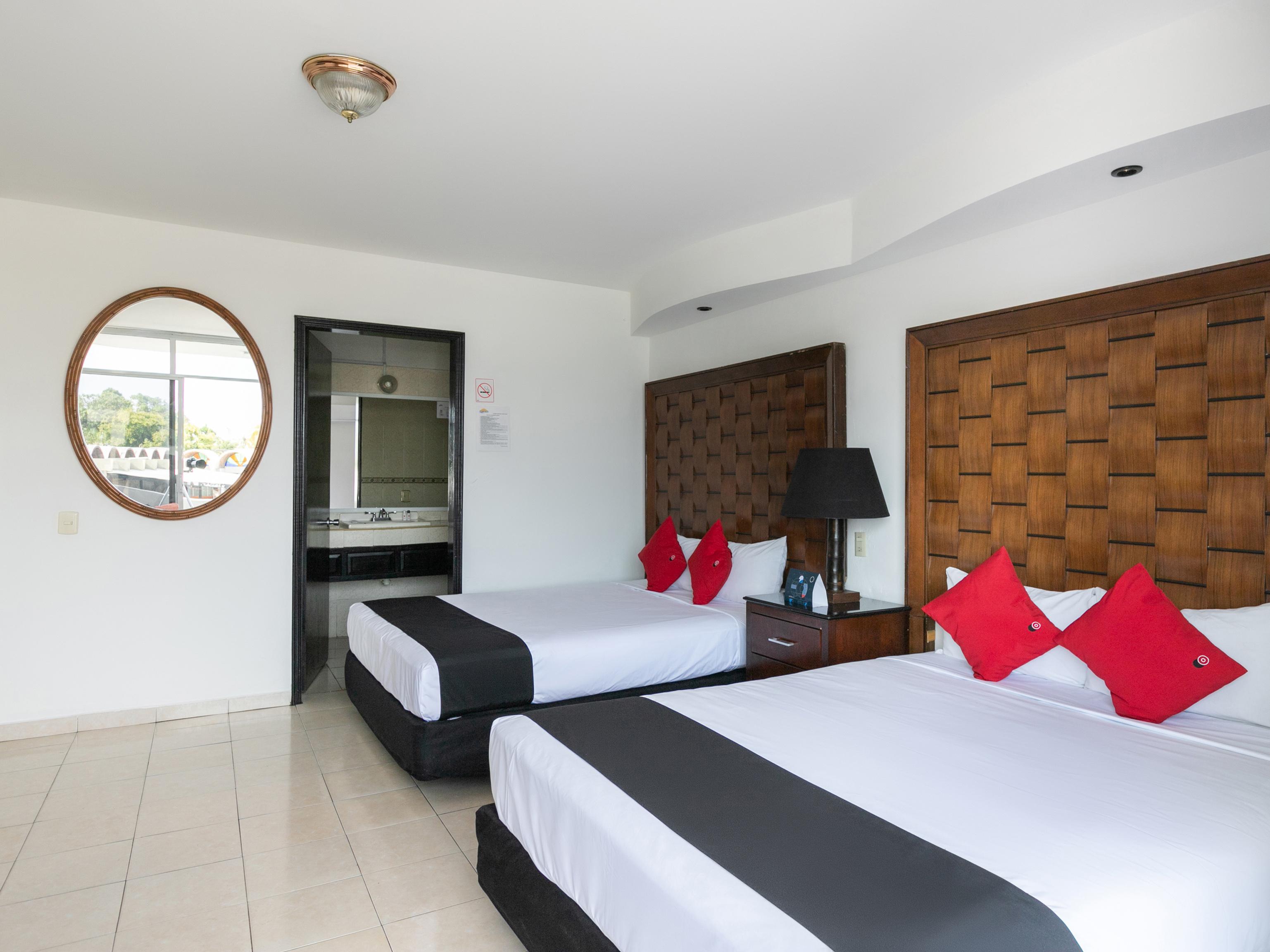 Capital O Zona Dorada Inn, Масатлан Экстерьер фото
