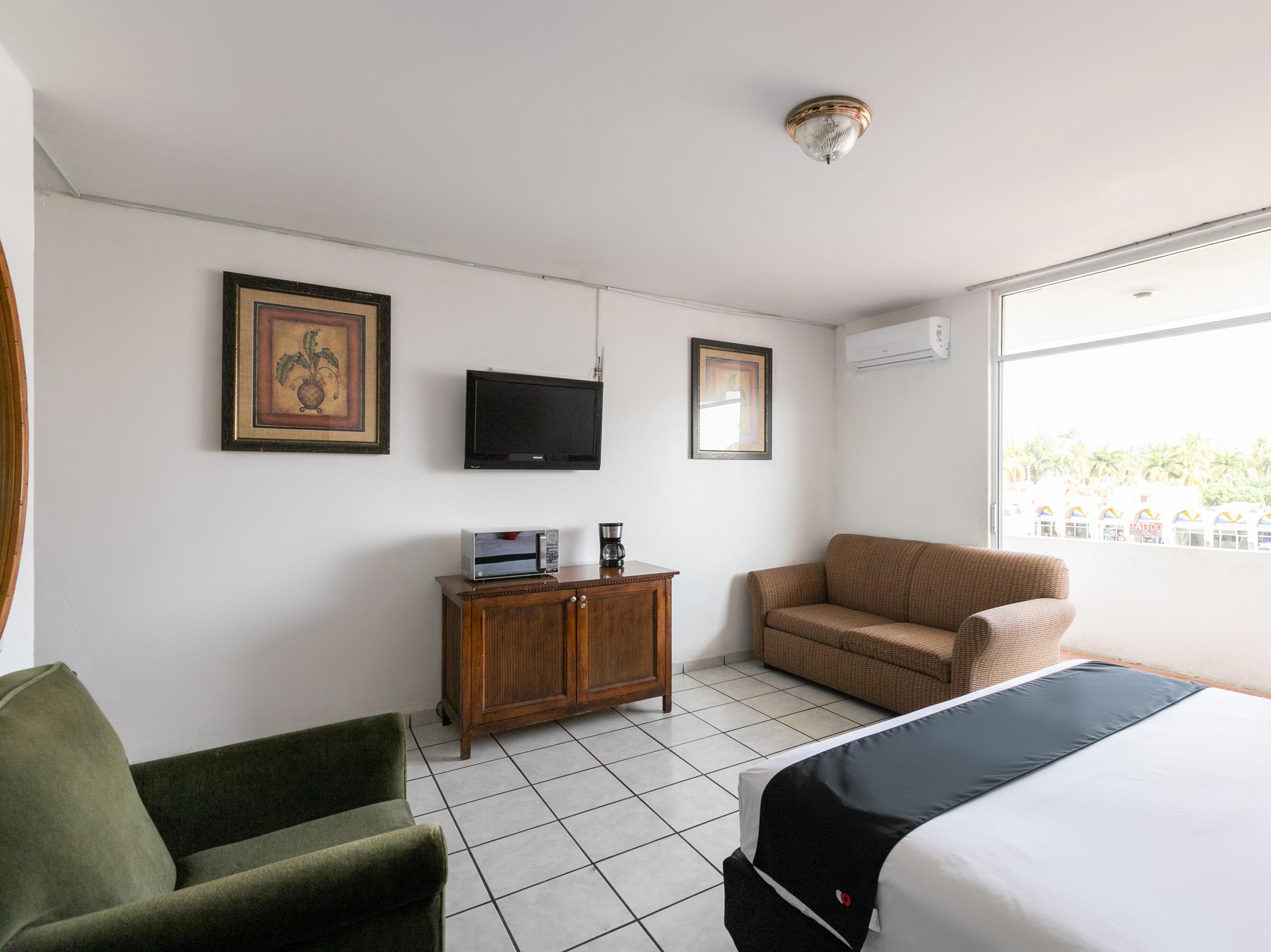 Capital O Zona Dorada Inn, Масатлан Экстерьер фото